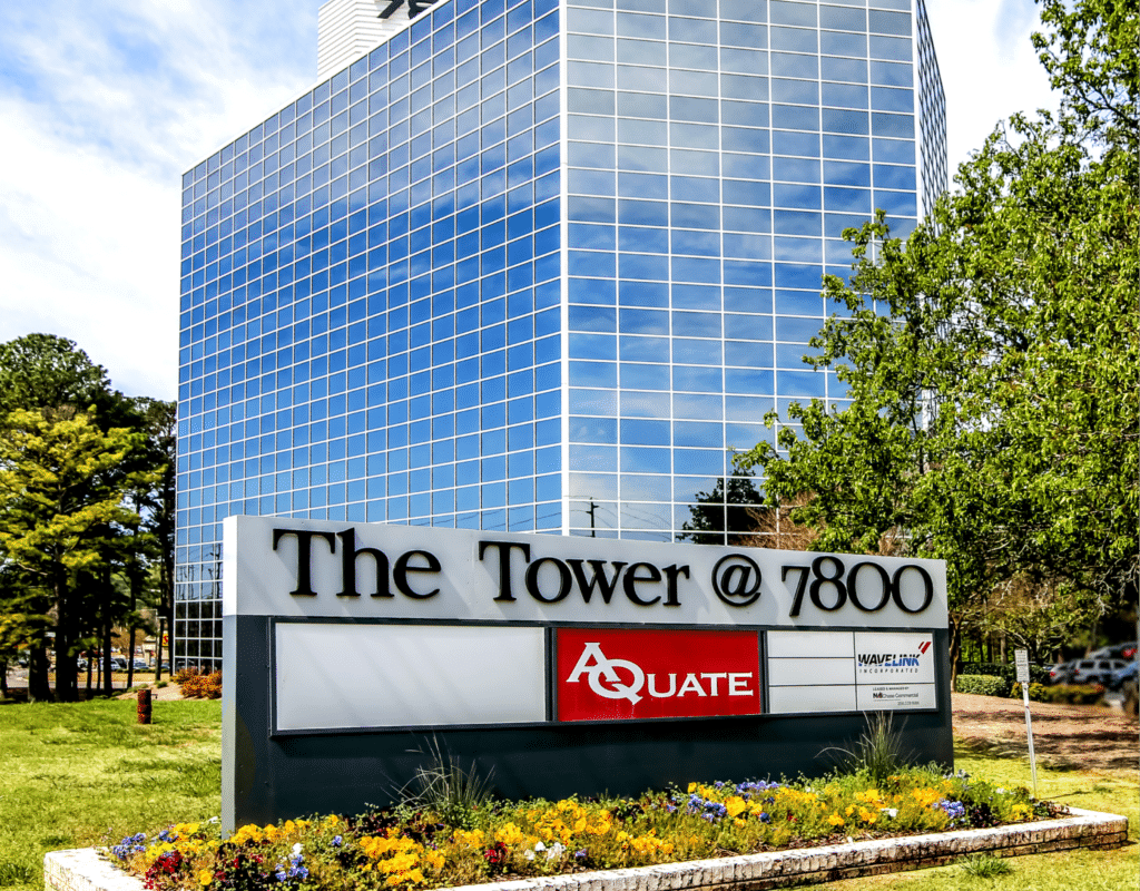 A Sign In Front Of A Building