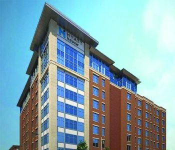 A Tall Building In A City