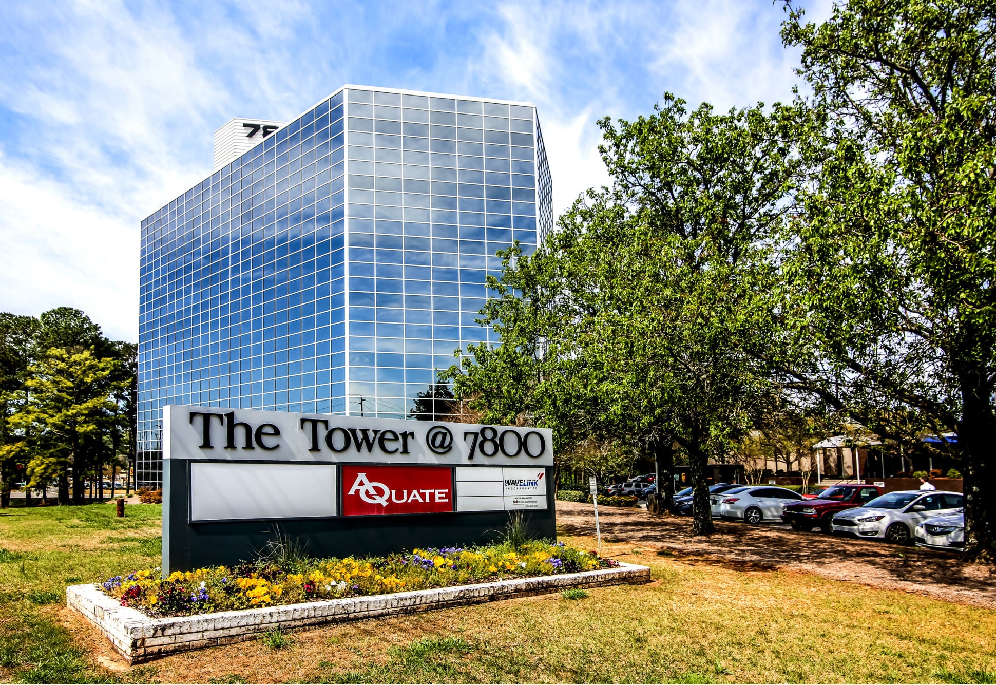 a sign in front of a building