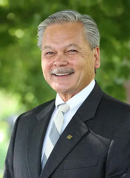 a man wearing a suit and tie