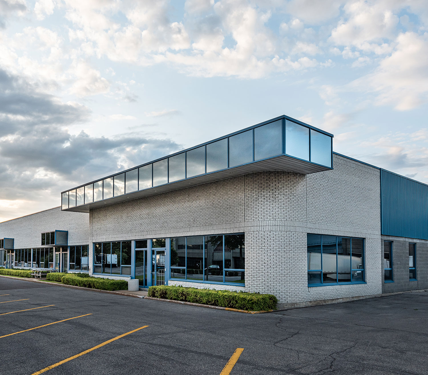 a building with a parking lot