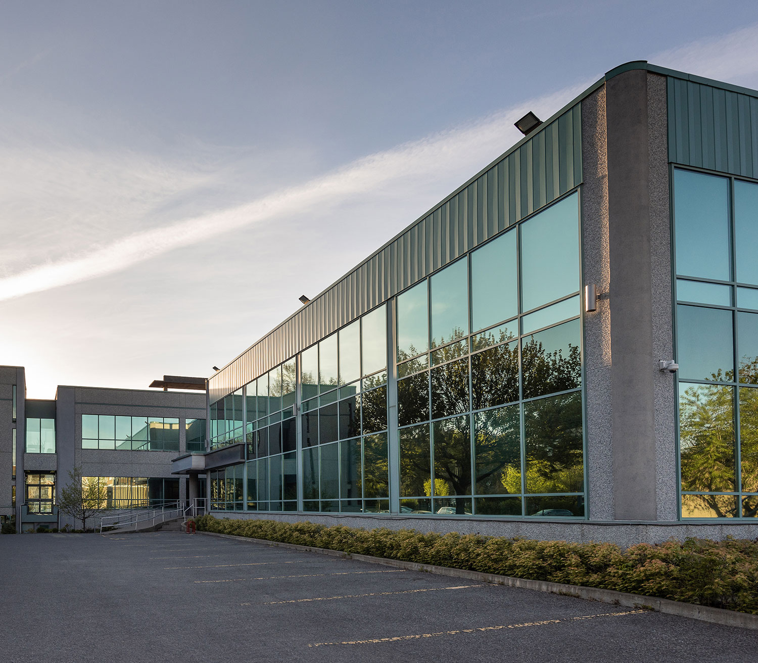 a building with a metal fence