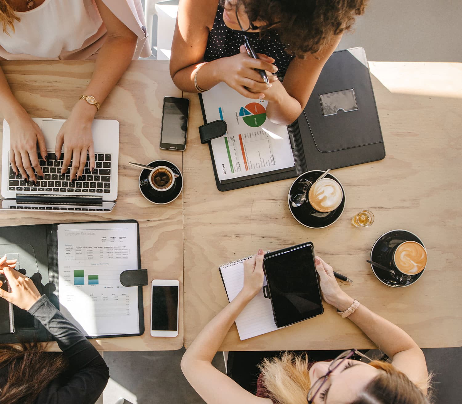 a group of people sitting on a table