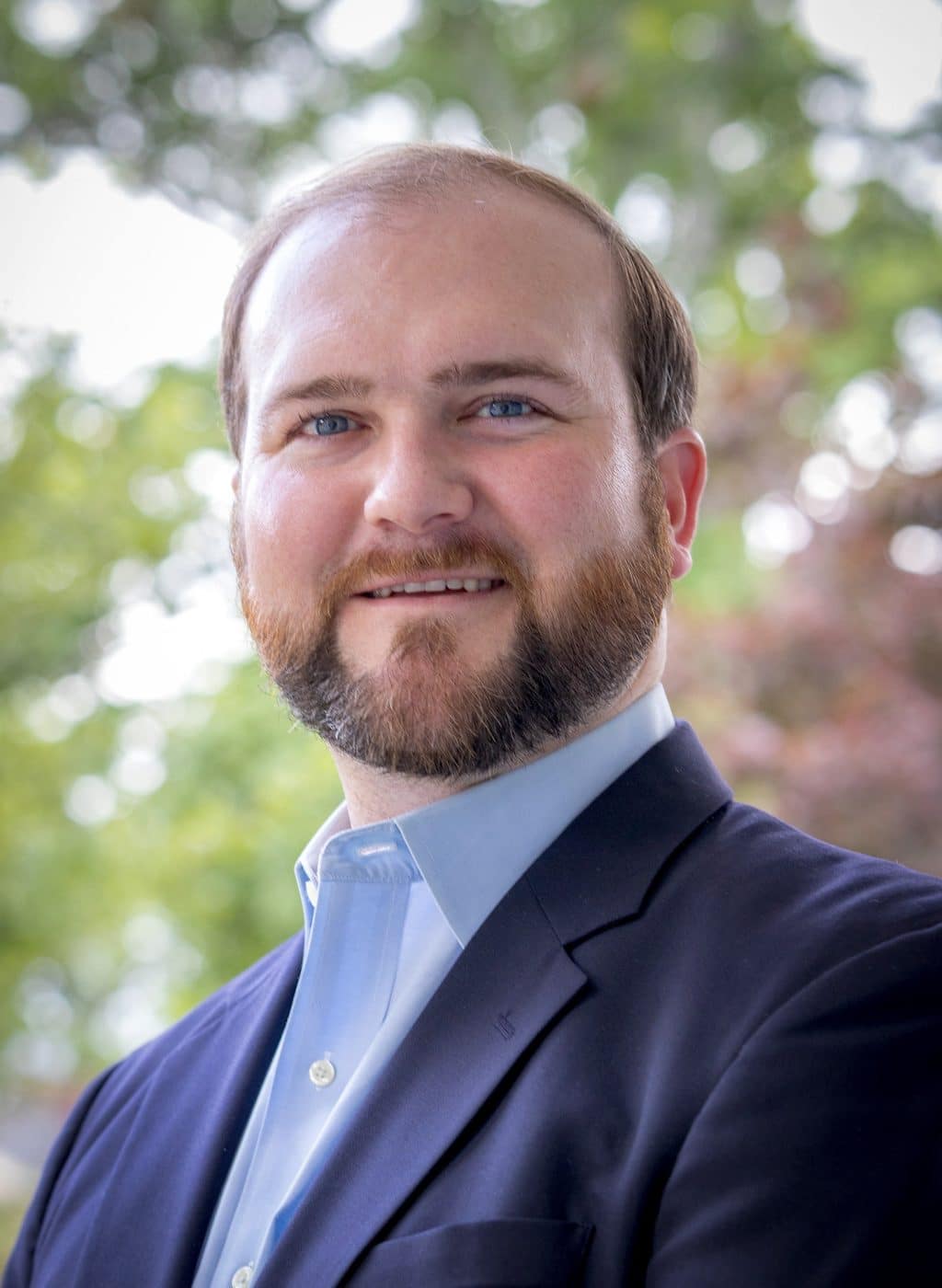 a man wearing a suit and tie