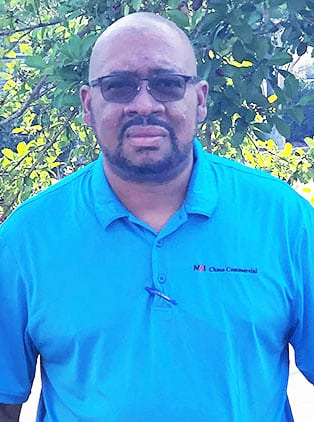 a man wearing a blue shirt