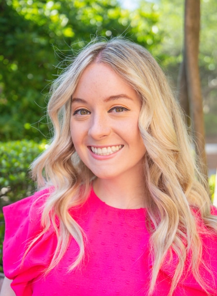 a woman smiling for the camera