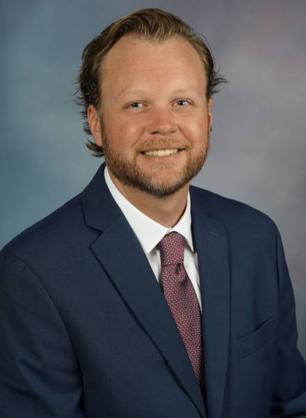 a man wearing a suit and tie