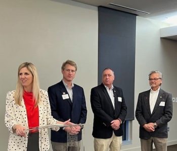 A Group Of People Posing For The Camera